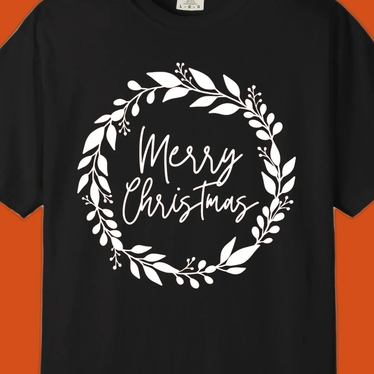 Merry Christmas text inside a white floral wreath graphic.