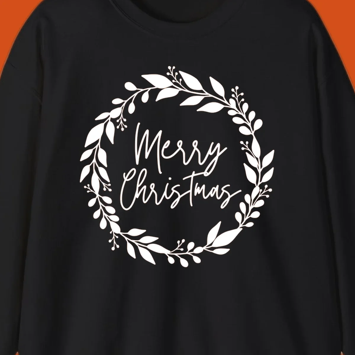 Merry Christmas text inside a white floral wreath graphic.