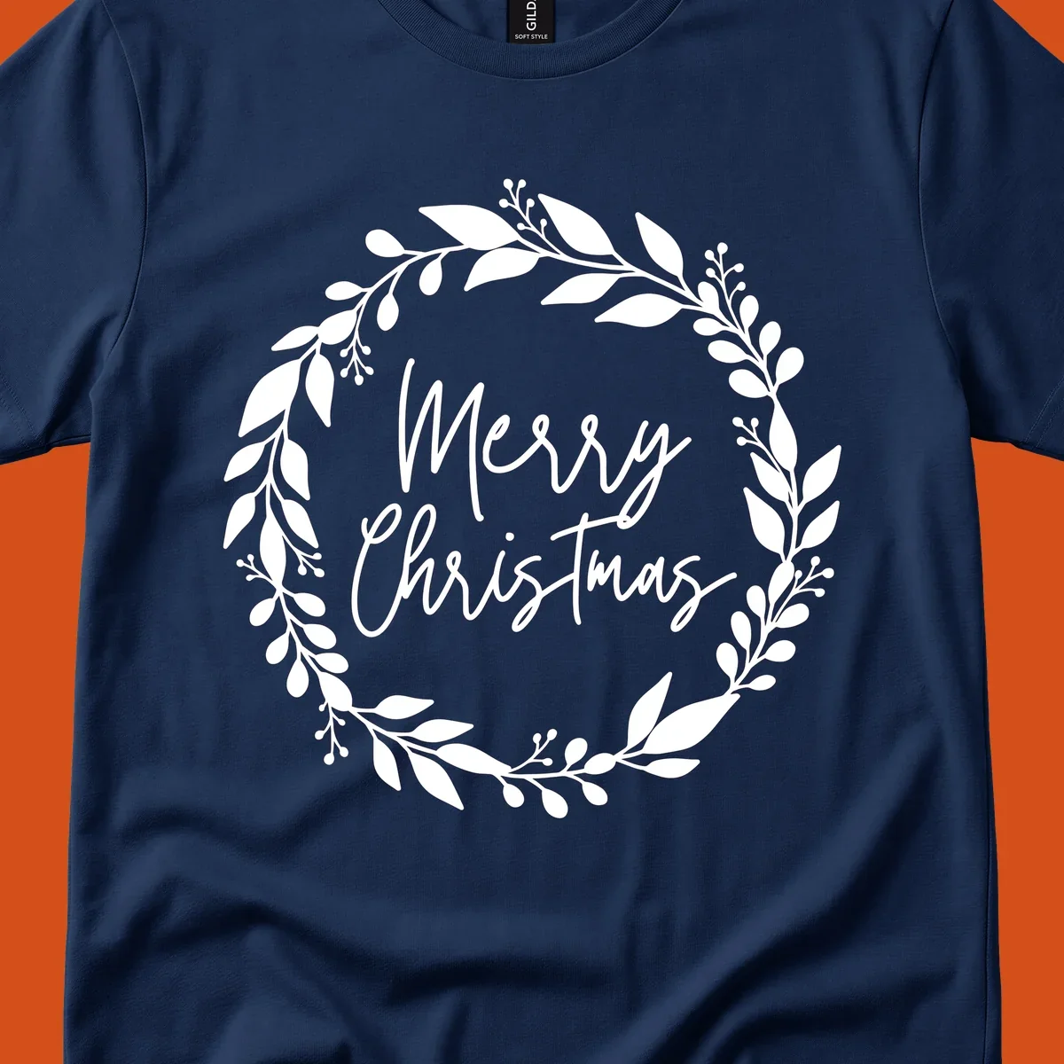 Merry Christmas text inside a white floral wreath graphic.