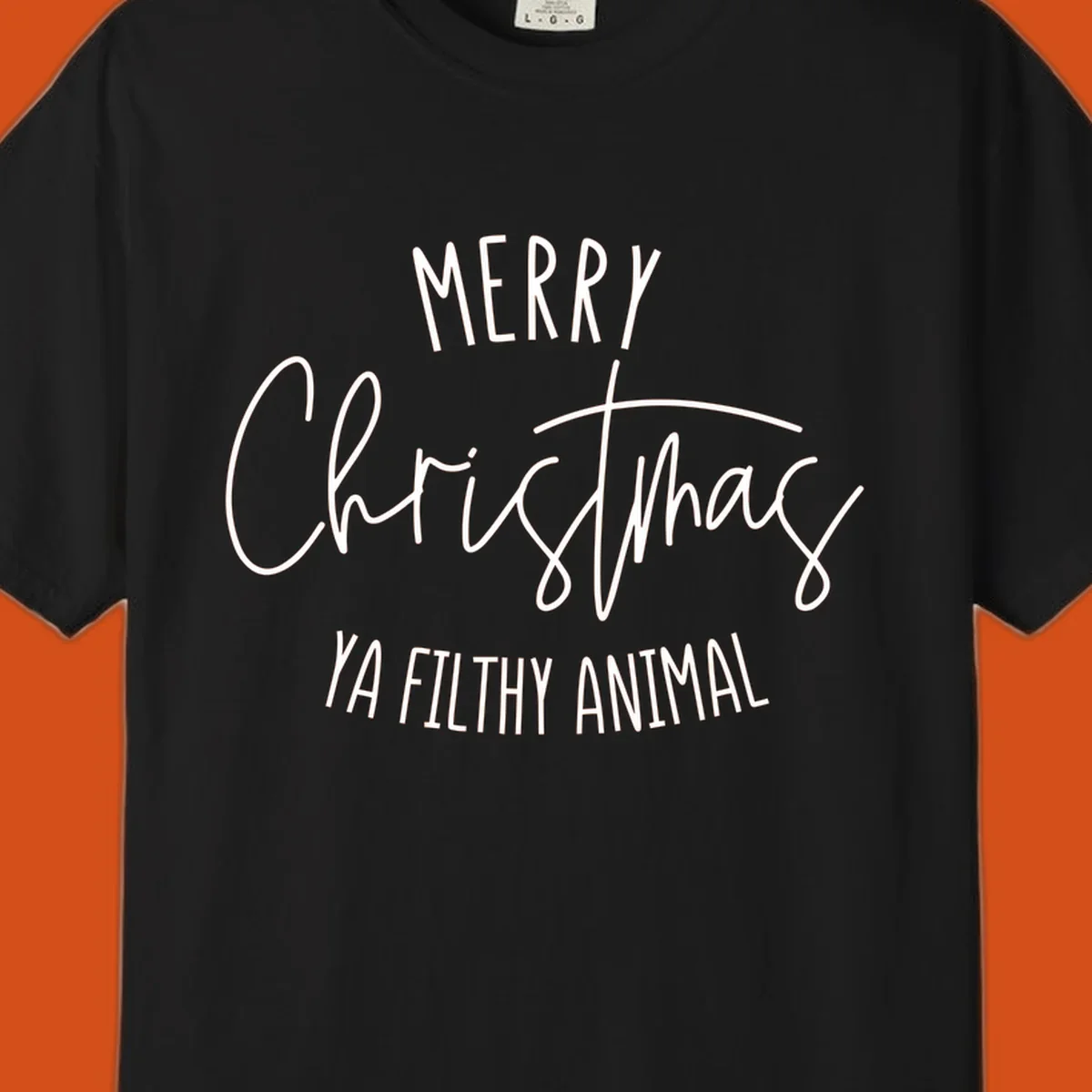 Merry Christmas Ya Filthy Animal text design in white, handwritten-style font.