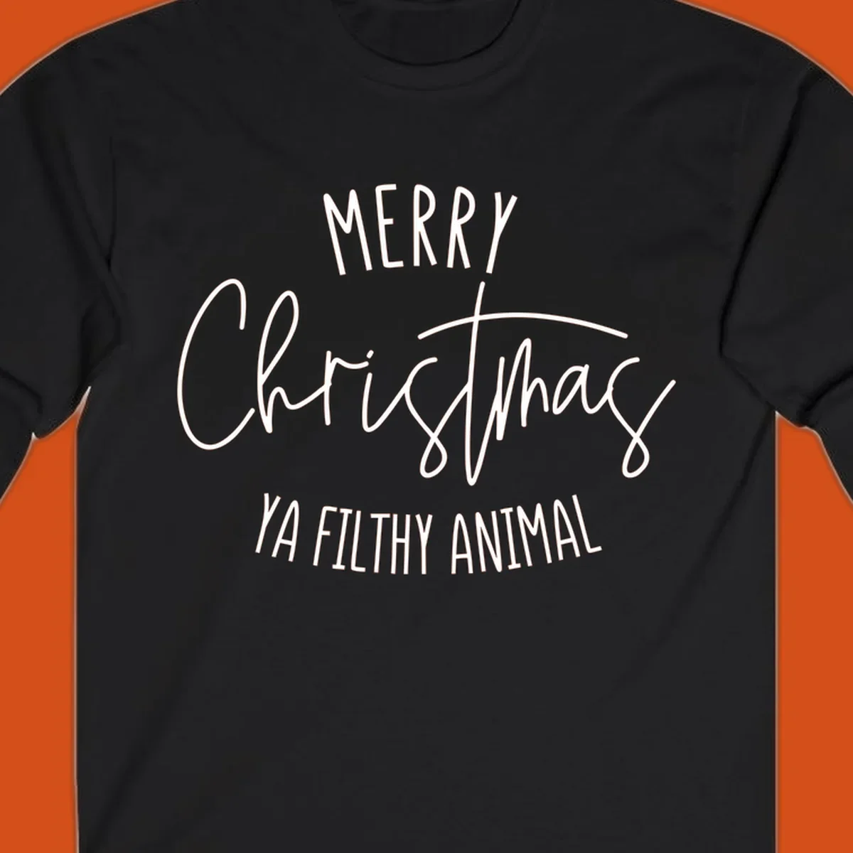 Merry Christmas Ya Filthy Animal text design in white, handwritten-style font.