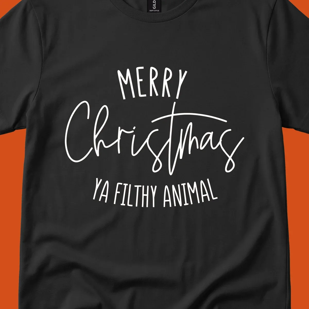 Merry Christmas Ya Filthy Animal text design in white, handwritten-style font.