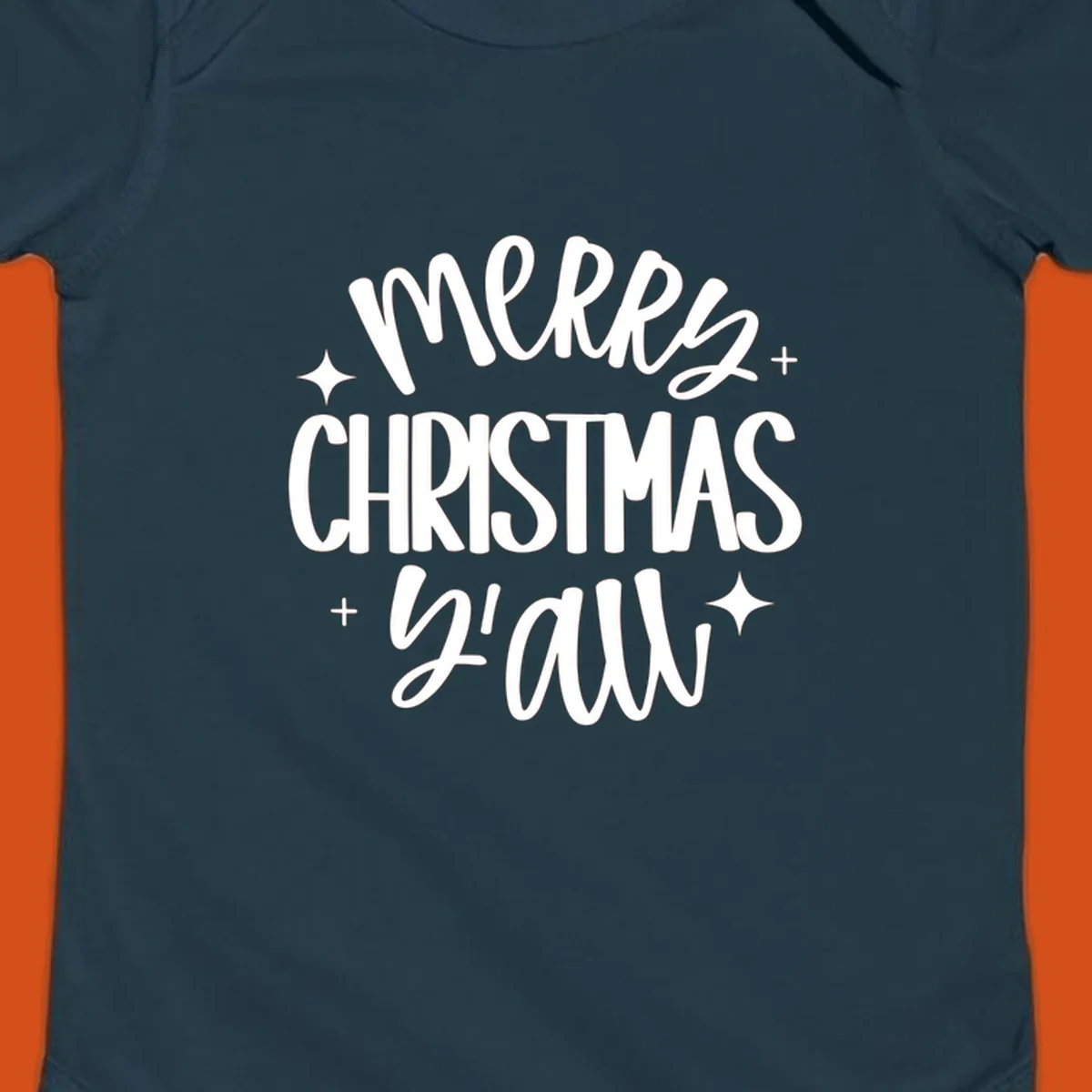Merry Christmas Y'all hand lettered design with star accents.