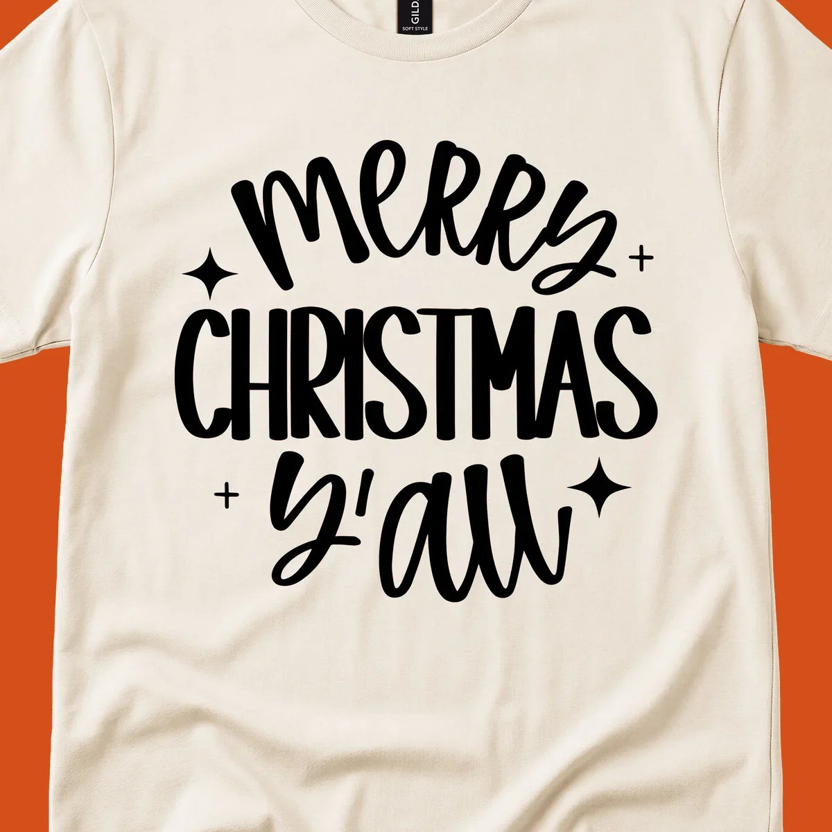 Merry Christmas Y'all hand lettered design with star accents.