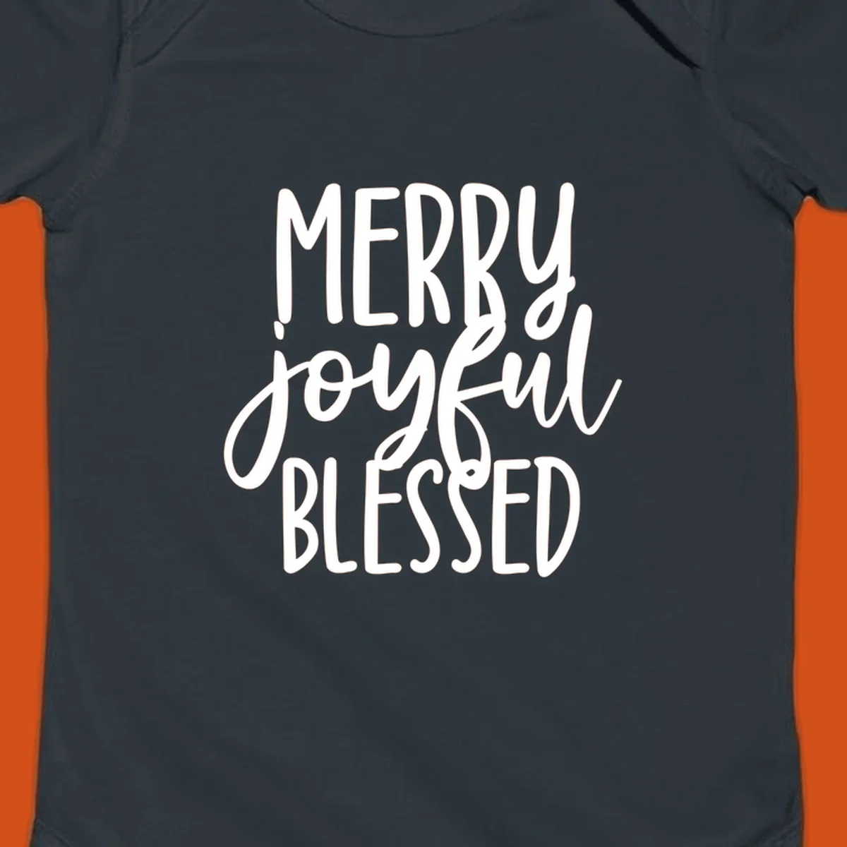 Merry Joyful Blessed holiday typography design with white text on a black background.