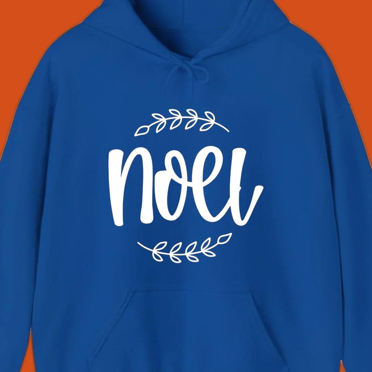 Elegant christmas noel script with leafy branches.