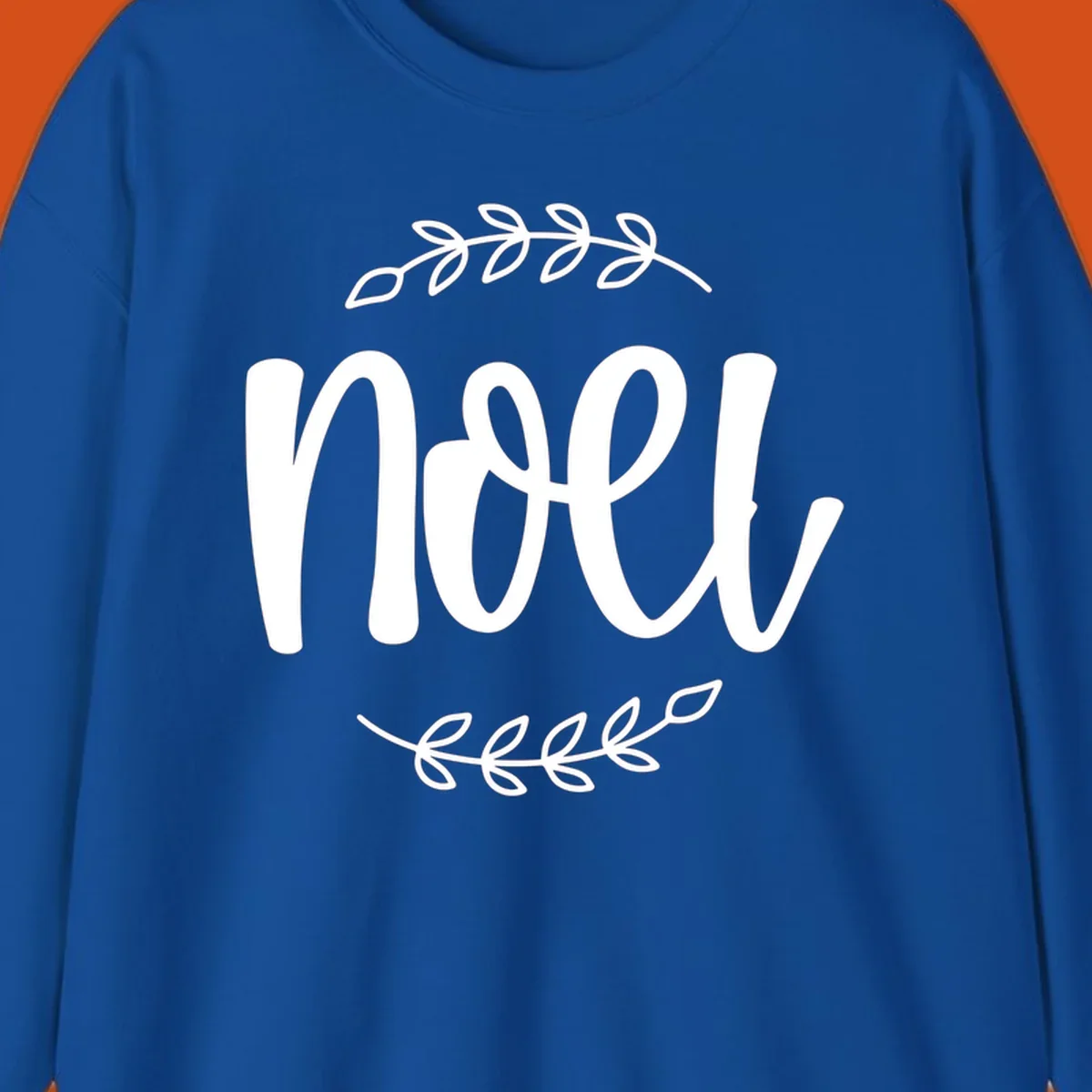 Elegant christmas noel script with leafy branches.