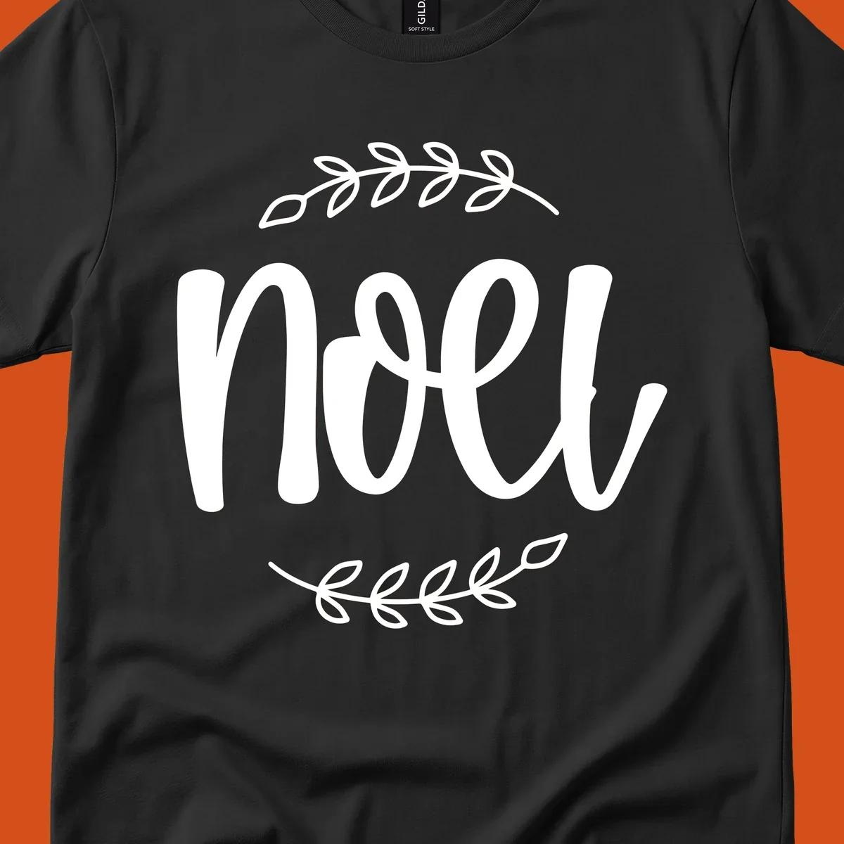 Elegant christmas noel script with leafy branches.