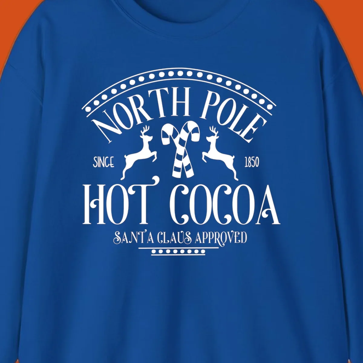 North Pole Hot Cocoa sign with reindeer and candy canes, Christmas holiday graphic.