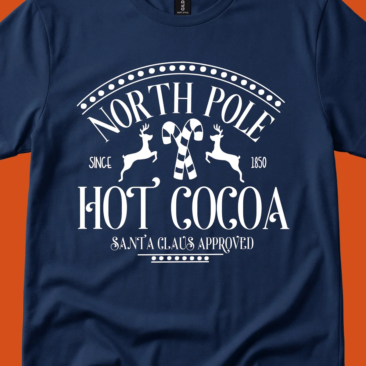 North Pole Hot Cocoa sign with reindeer and candy canes, Christmas holiday graphic.