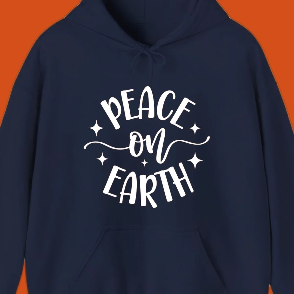 Peace on Earth holiday typography design with stars and swirls.