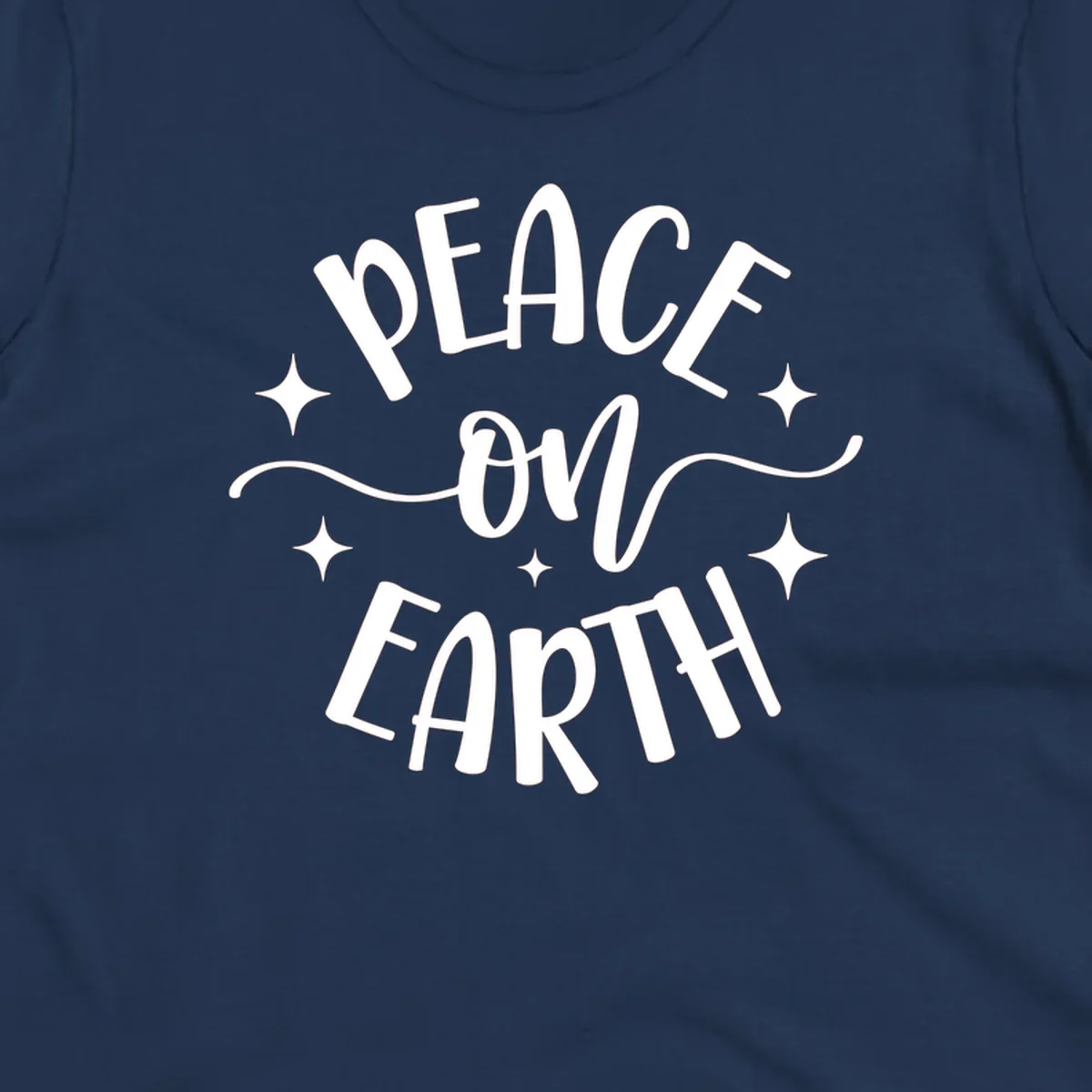 Peace on Earth holiday typography design with stars and swirls.