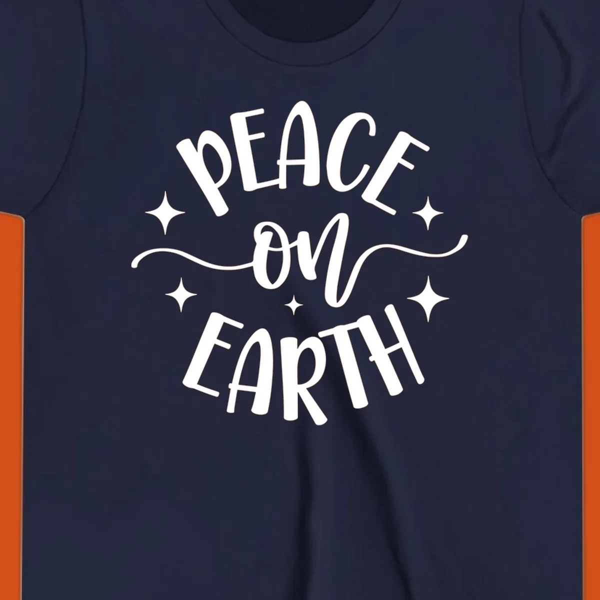 Peace on Earth holiday typography design with stars and swirls.