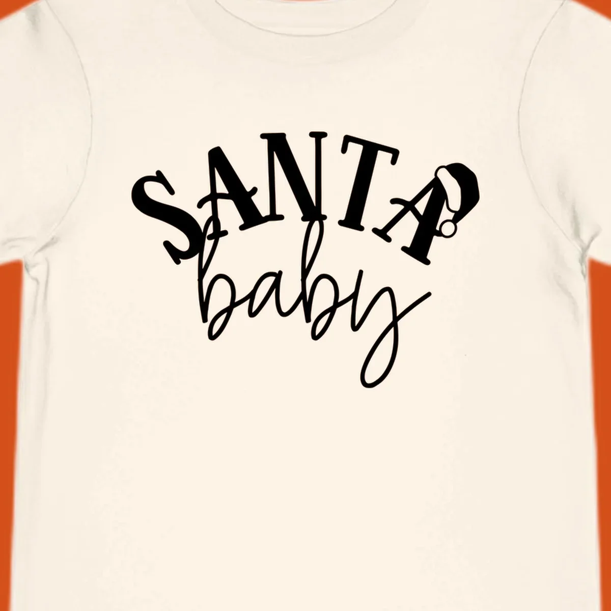 Santa baby Christmas text design with a Santa hat on the letter A.