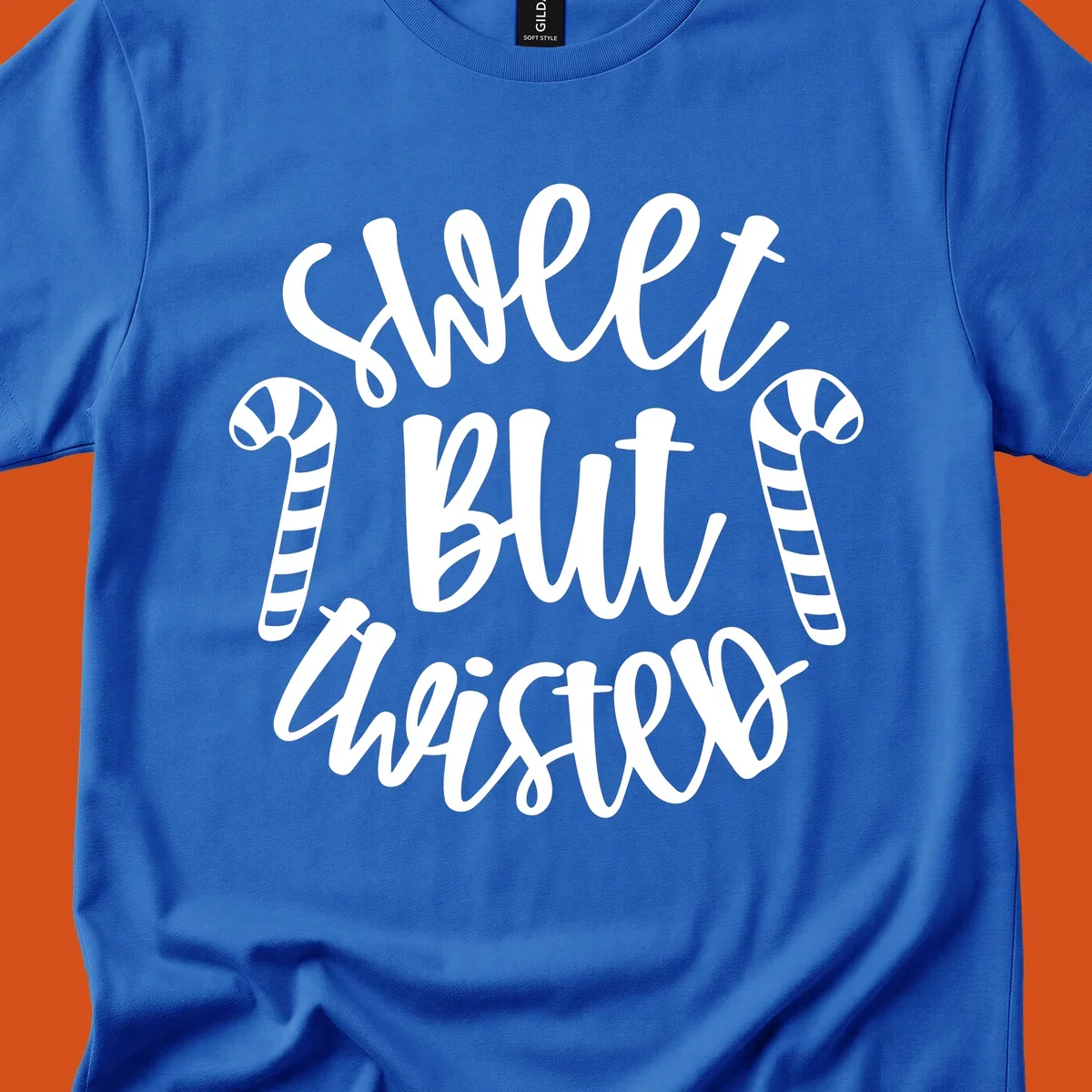 Sweet but twisted text with candy canes holiday graphic.