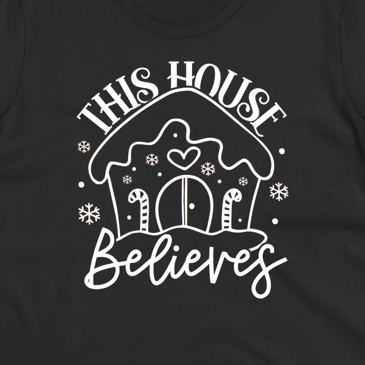 Gingerbread house graphic with 'This House Believes' text for Christmas.