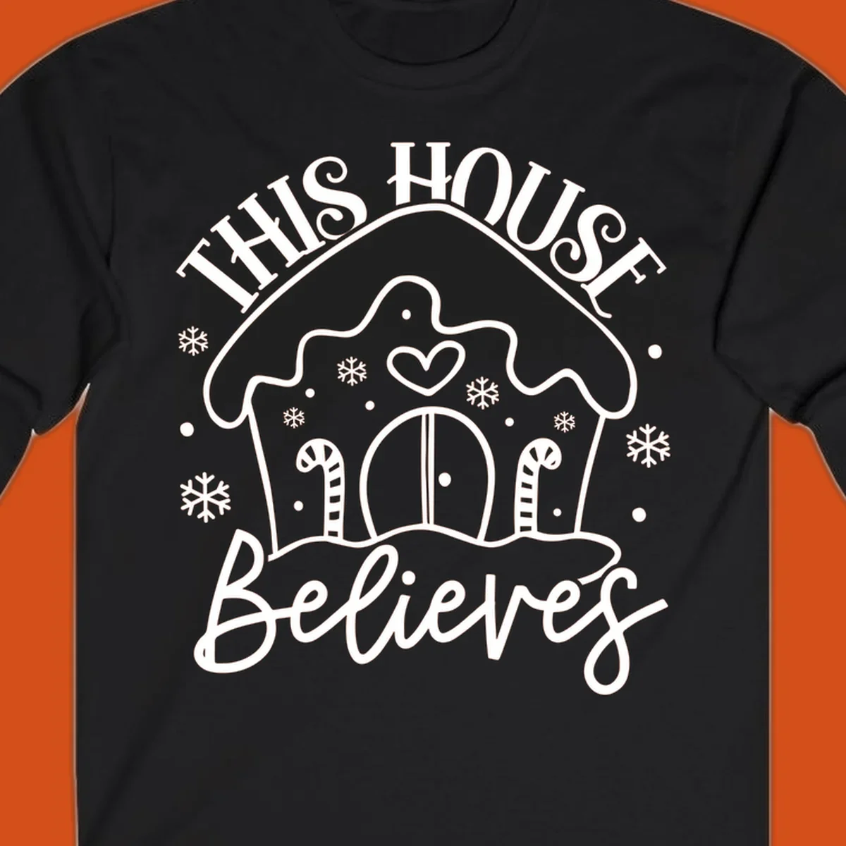 Gingerbread house graphic with 'This House Believes' text for Christmas.