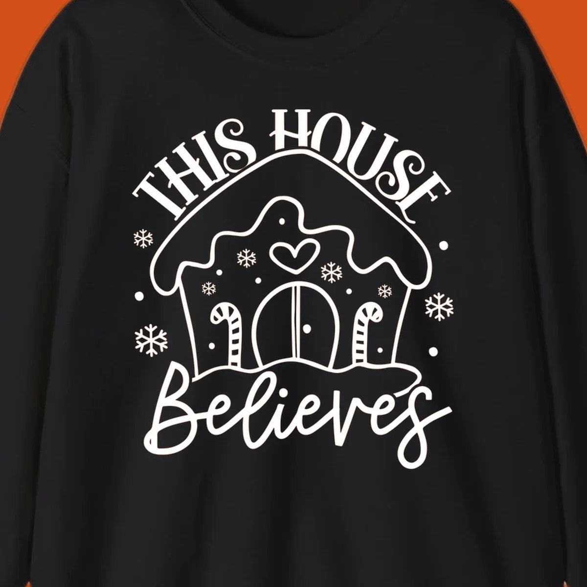 Gingerbread house graphic with 'This House Believes' text for Christmas.
