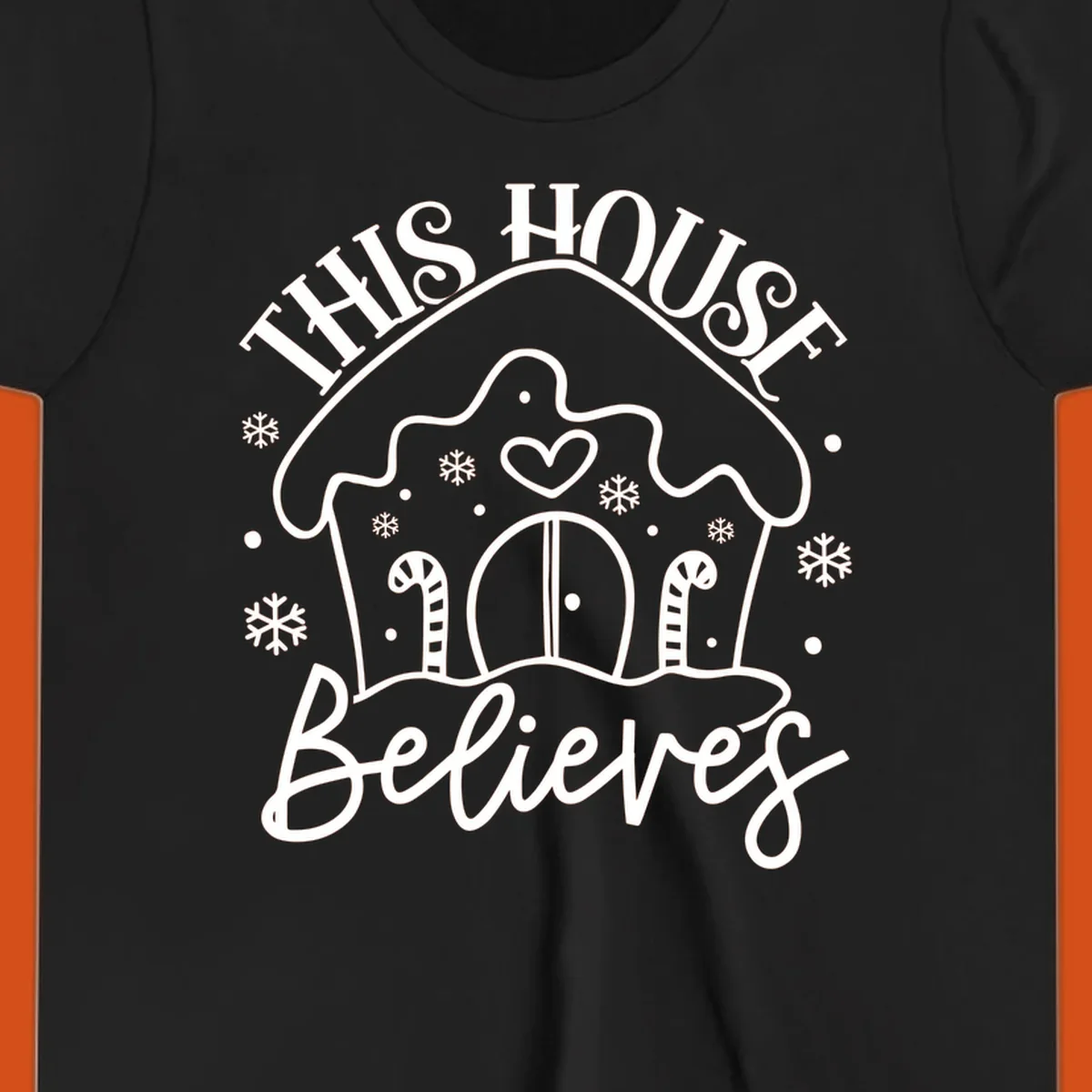 Gingerbread house graphic with 'This House Believes' text for Christmas.