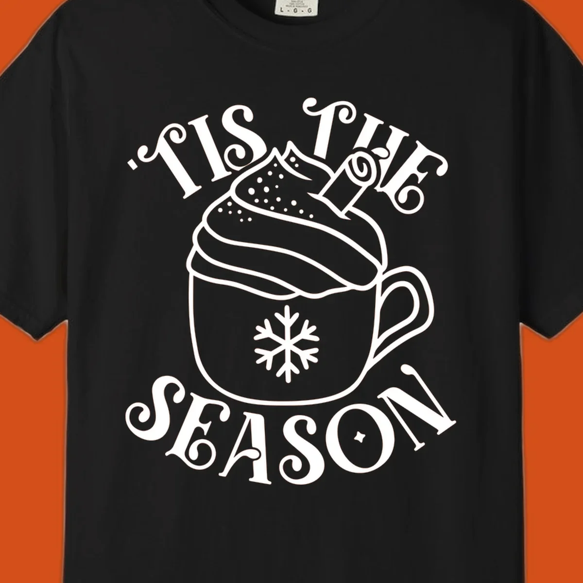 Tis the season hot cocoa mug with snowflake and cinnamon stick, white design on black.