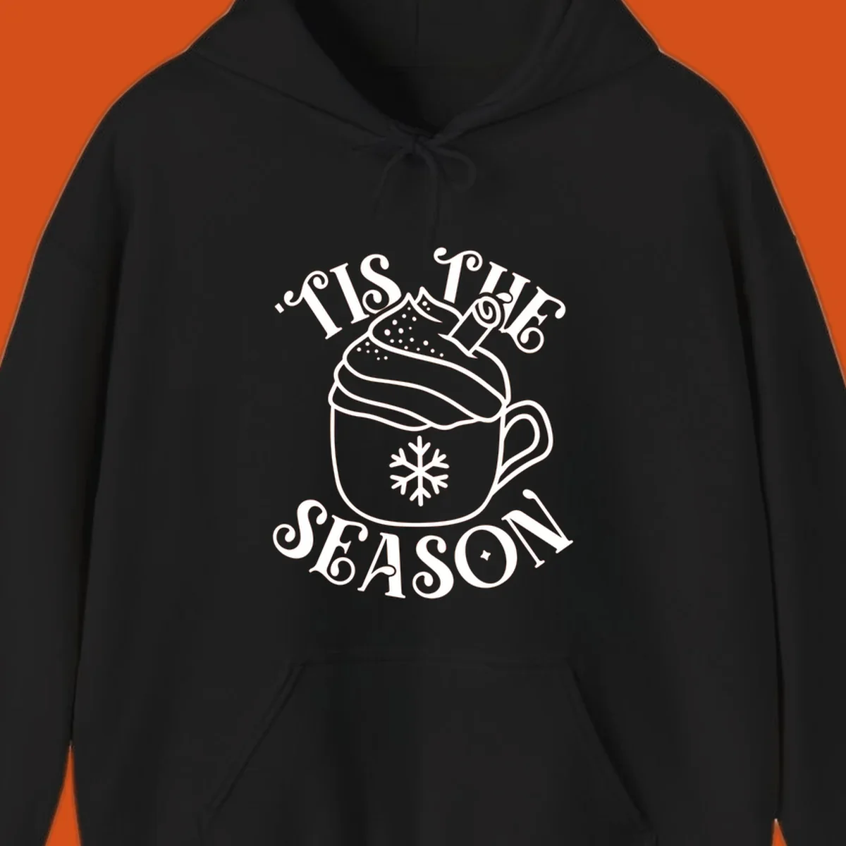 Tis the season hot cocoa mug with snowflake and cinnamon stick, white design on black.