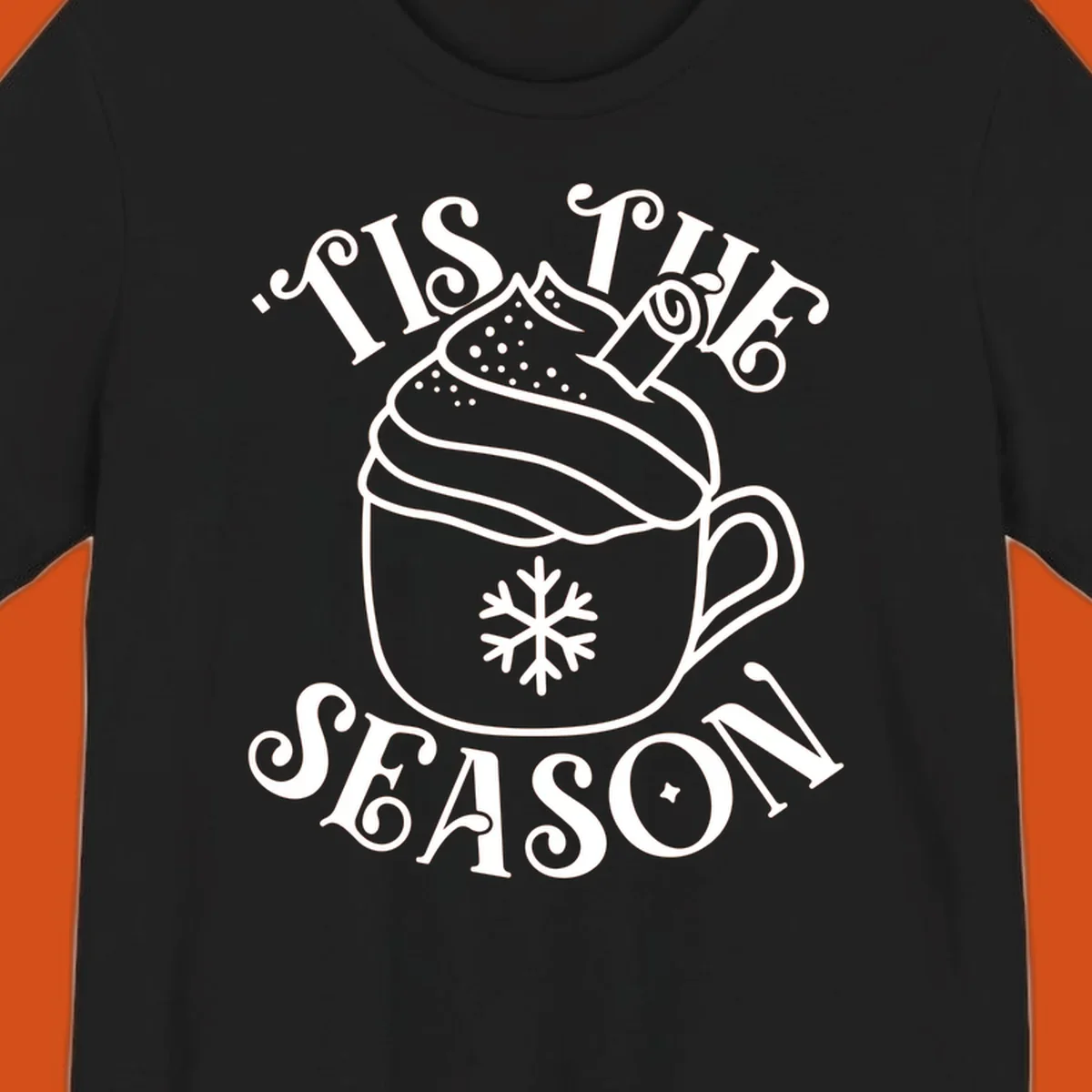 Tis the season hot cocoa mug with snowflake and cinnamon stick, white design on black.