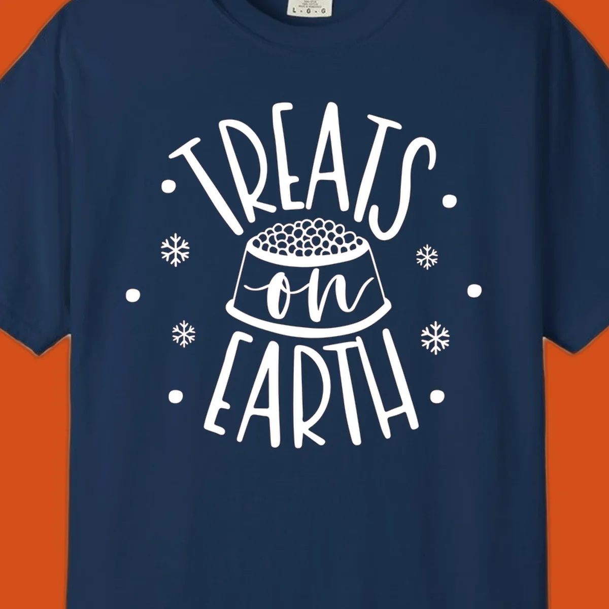 Holiday dog treats on earth text with dog bowl and snowflakes.