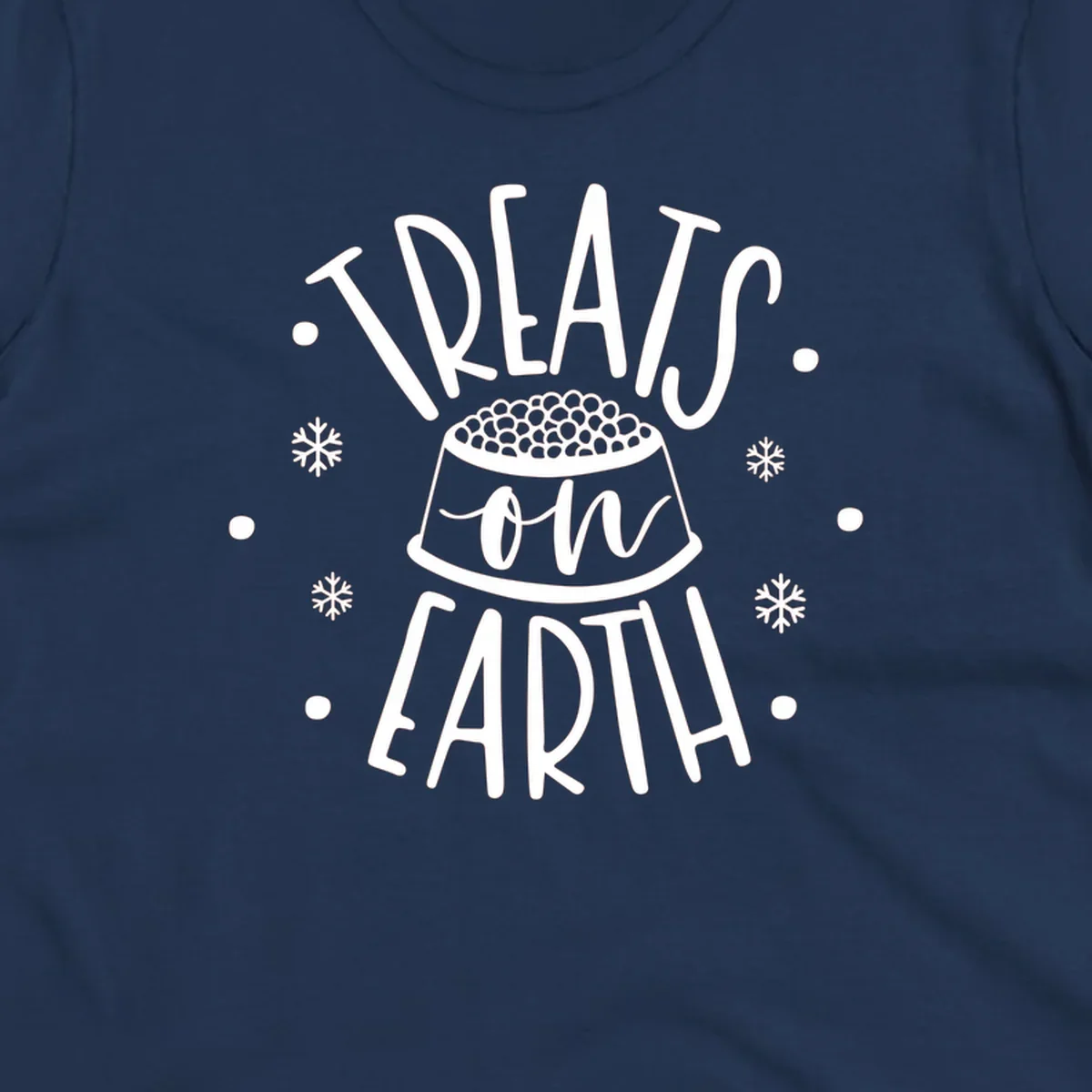 Holiday dog treats on earth text with dog bowl and snowflakes.