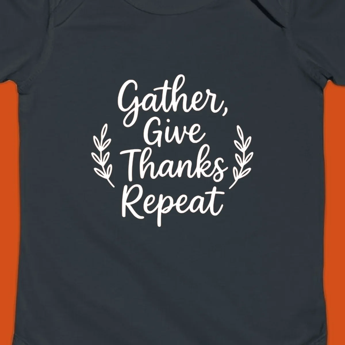 Thanksgiving gather repeat phrase in white typography with leaf accents.