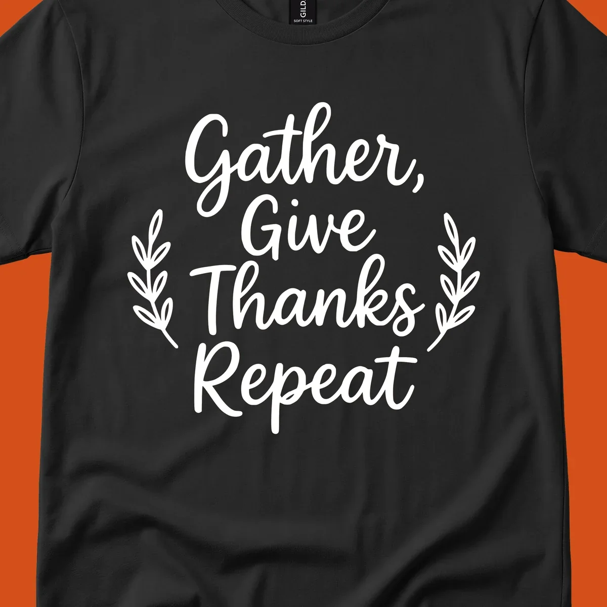 Thanksgiving gather repeat phrase in white typography with leaf accents.