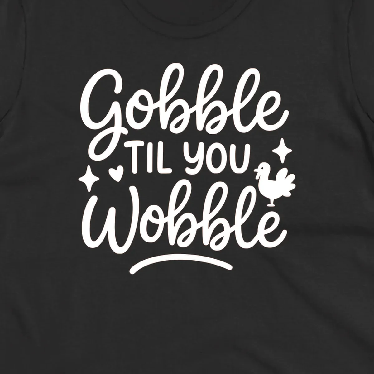 Gobble Til You Wobble Thanksgiving turkey graphic with fun lettering.