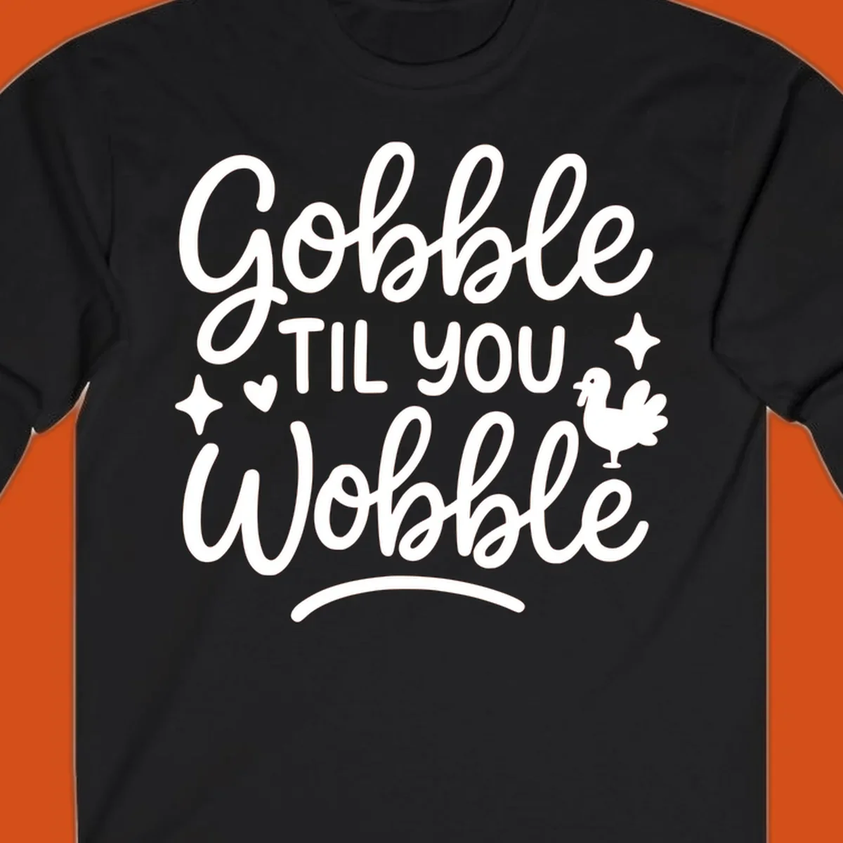 Gobble Til You Wobble Thanksgiving turkey graphic with fun lettering.