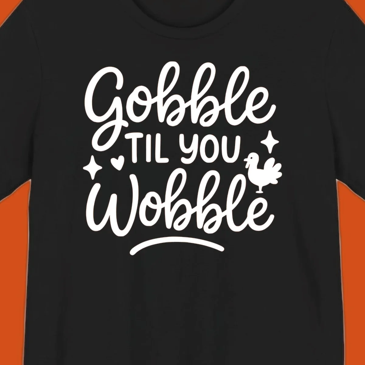 Gobble Til You Wobble Thanksgiving turkey graphic with fun lettering.