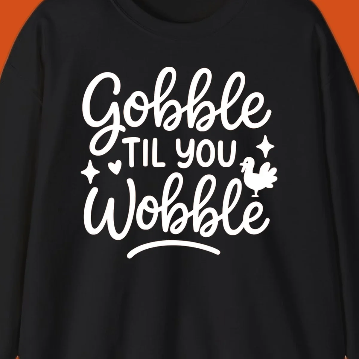 Gobble Til You Wobble Thanksgiving turkey graphic with fun lettering.