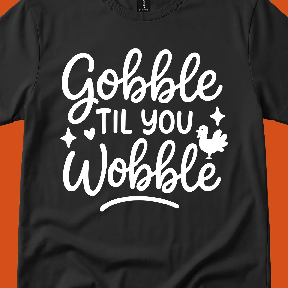Gobble Til You Wobble Thanksgiving turkey graphic with fun lettering.