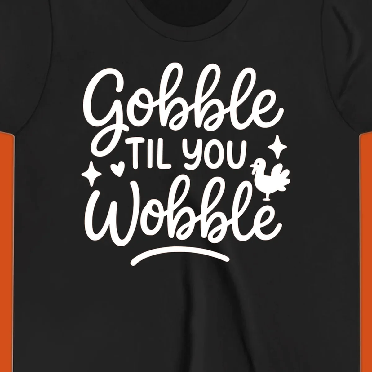 Gobble Til You Wobble Thanksgiving turkey graphic with fun lettering.