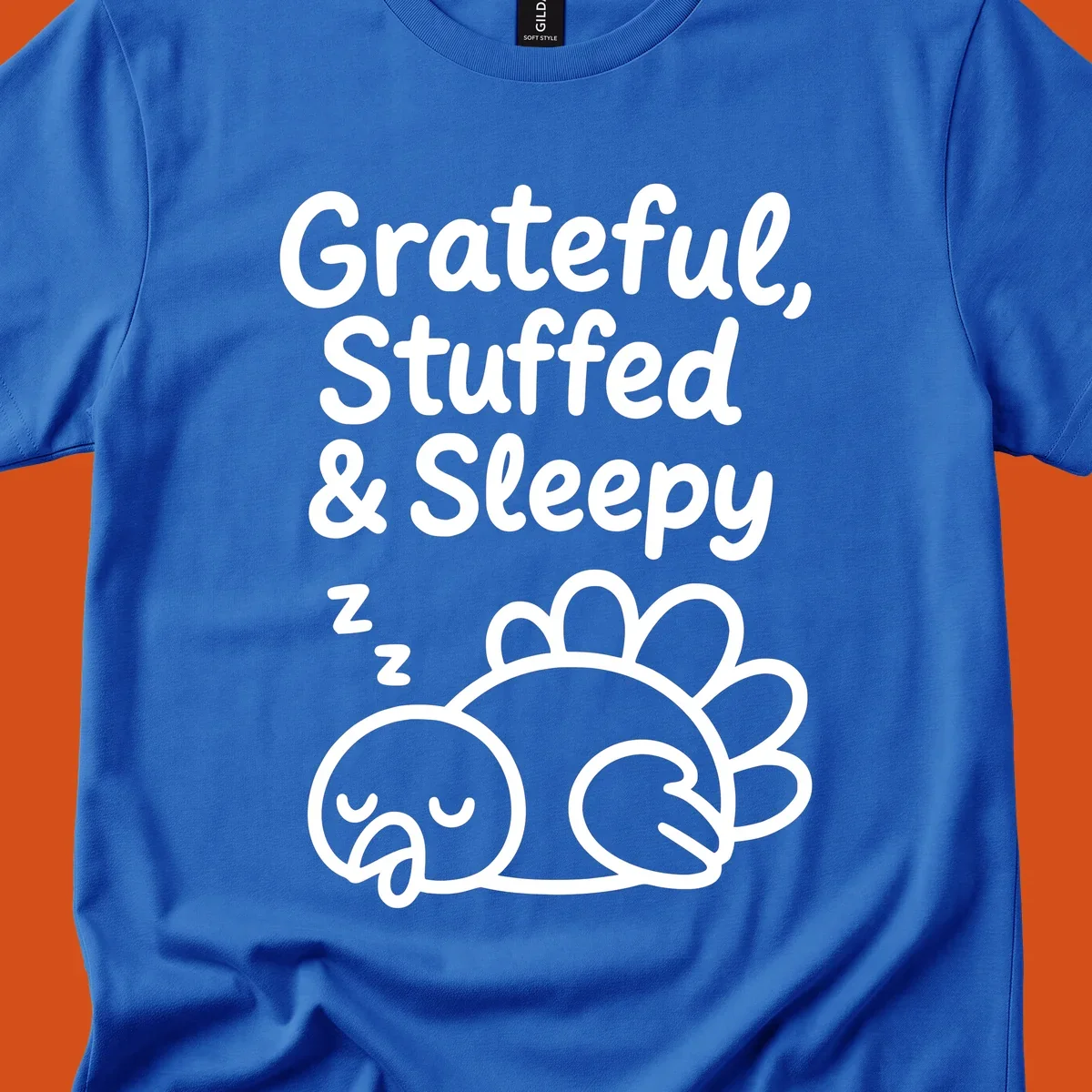 Grateful, Stuffed & Sleepy text with a sleeping turkey, representing the thanksgiving-food-coma.