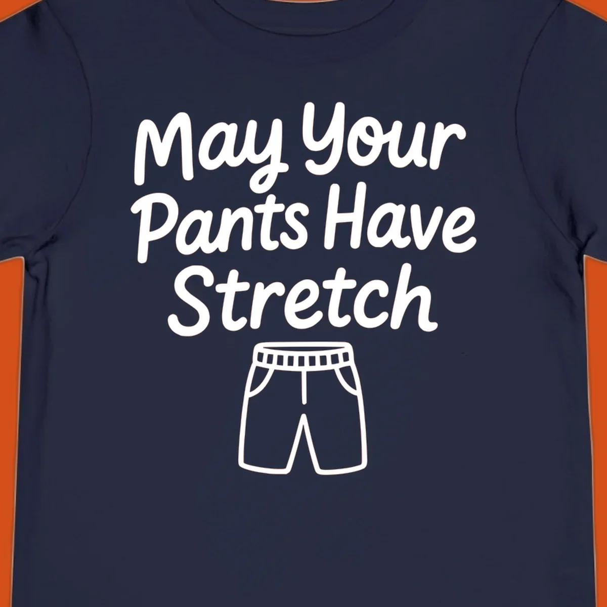 May Your Pants Have Stretch text and shorts illustration on black background.