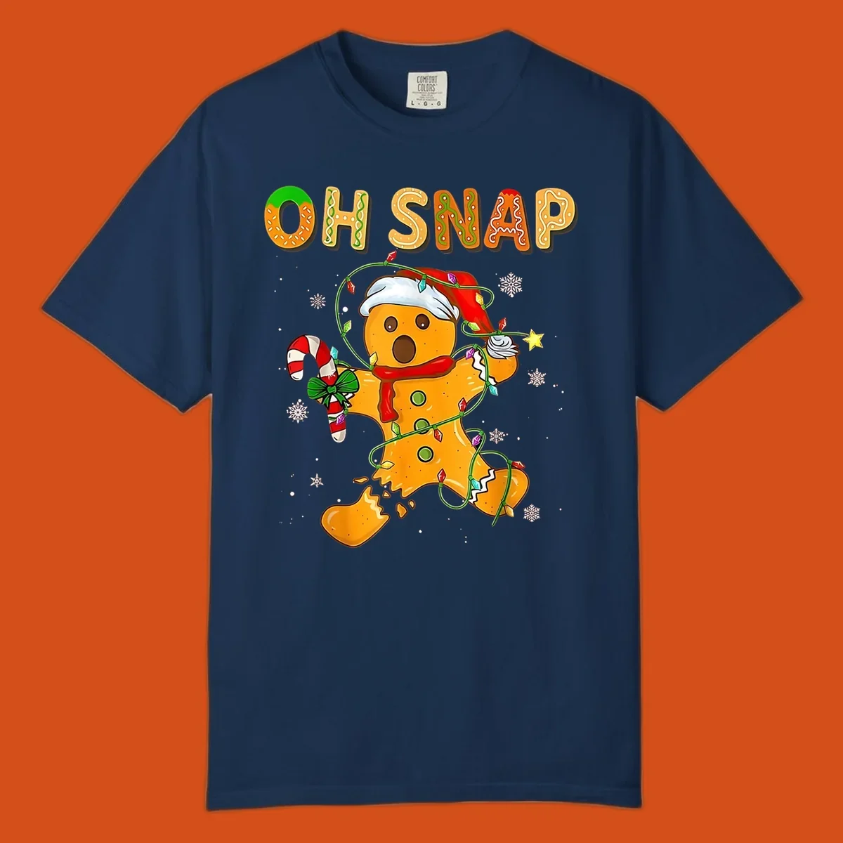 Oh snap gingerbread man tangled in christmas lights broken in half with text, funny holiday design.