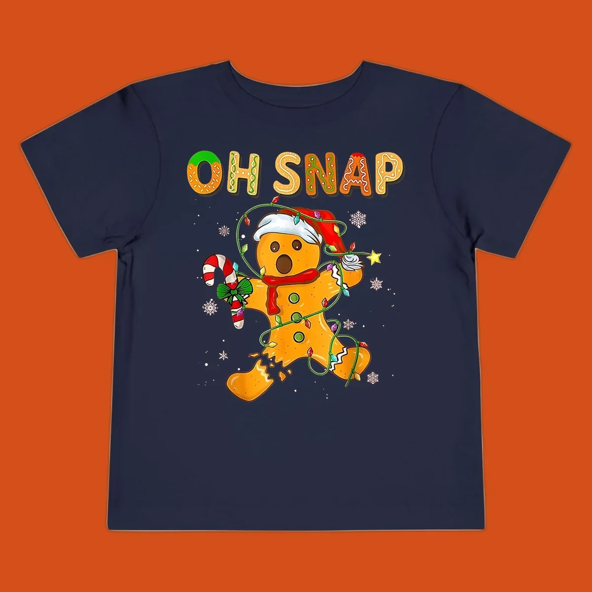 Oh snap gingerbread man tangled in christmas lights broken in half with text, funny holiday design.