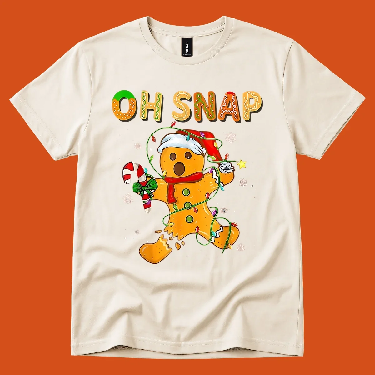 Oh snap gingerbread man tangled in christmas lights broken in half with text, funny holiday design.
