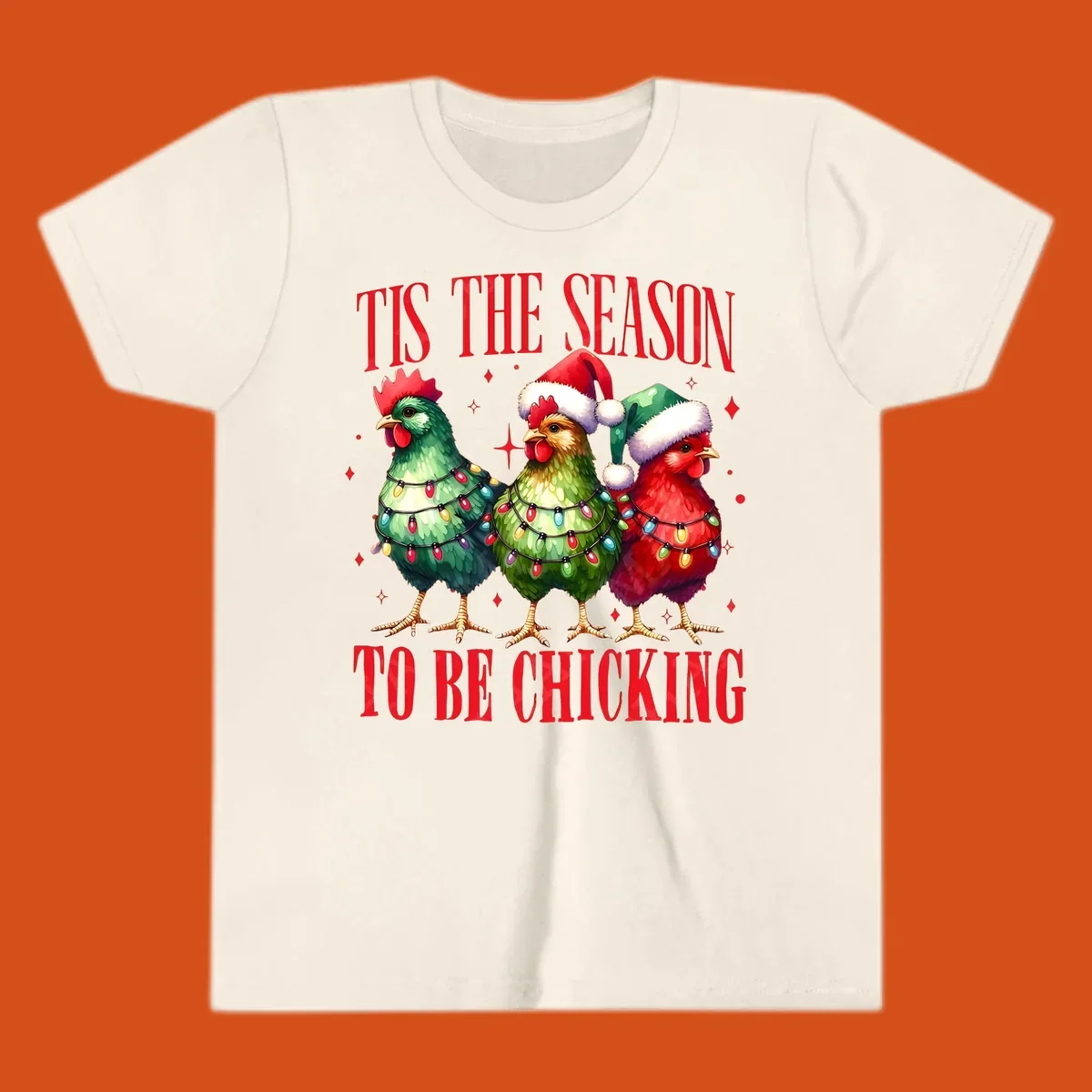Christmas chickens wearing Santa hats and decorated with lights, with text 'Tis The Season To Be Chicking'.