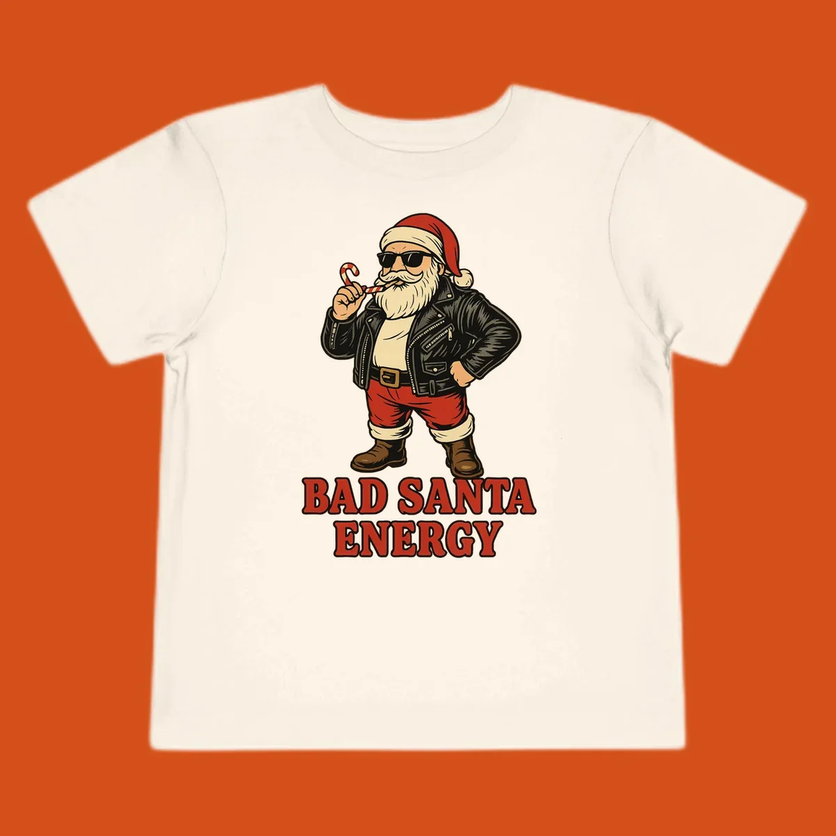 Illustration of a cool, sunglasses-wearing Santa with a leather jacket and the text BAD SANTA ENERGY. Bad Santa Energy.