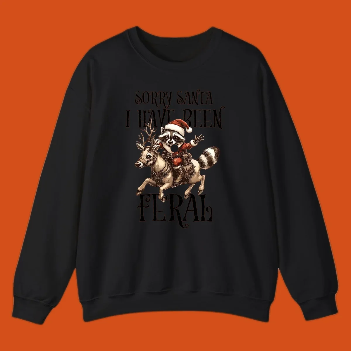 Feral raccoon in Santa hat riding reindeer, with text sorry santa i have been feral.
