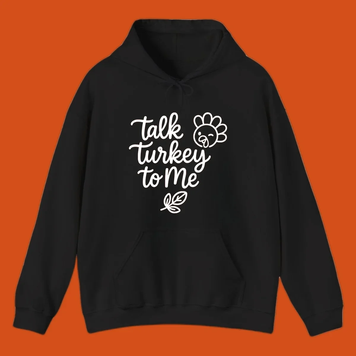 Talk Turkey To Me Thanksgiving phrase with cartoon turkey and leaf illustration.