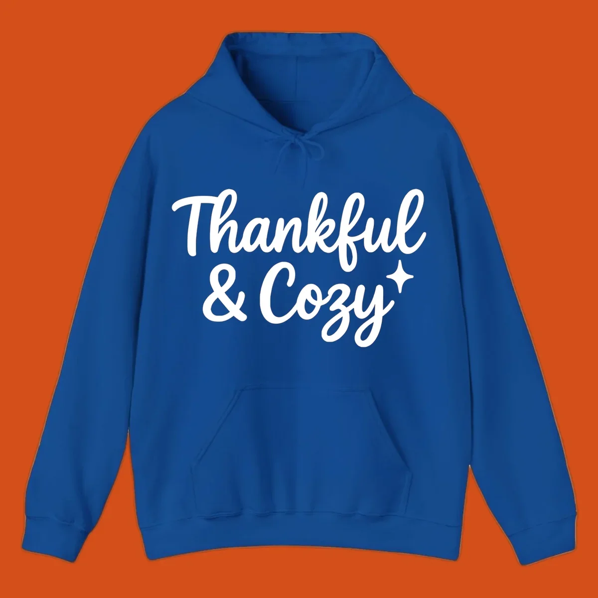 Thankful and cozy script text with starburst design.