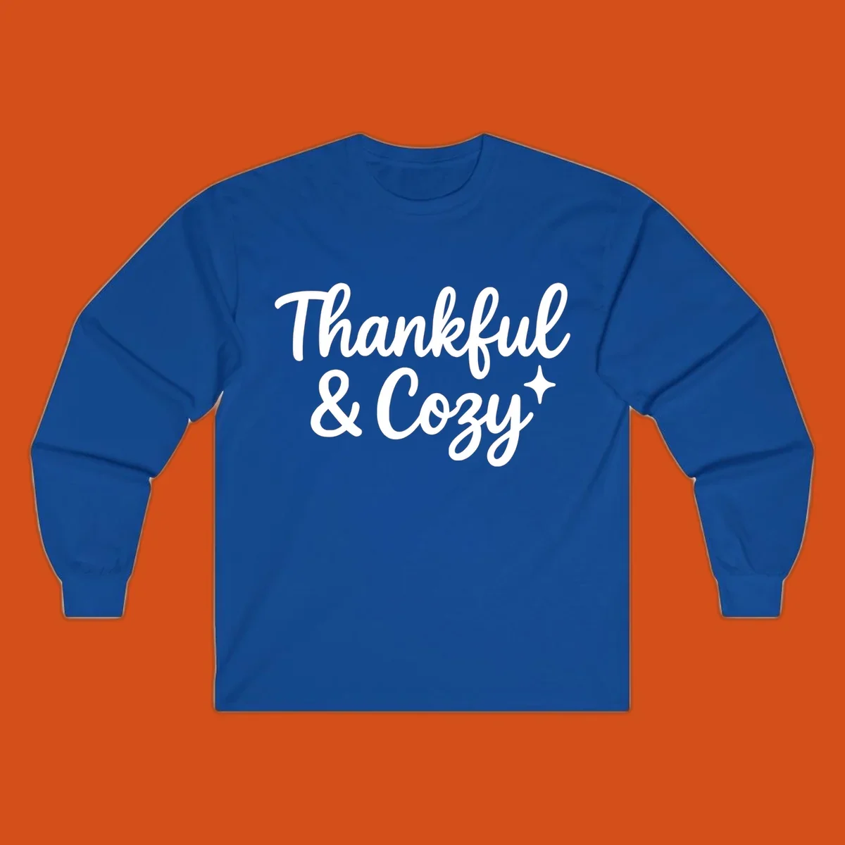 Thankful and cozy script text with starburst design.