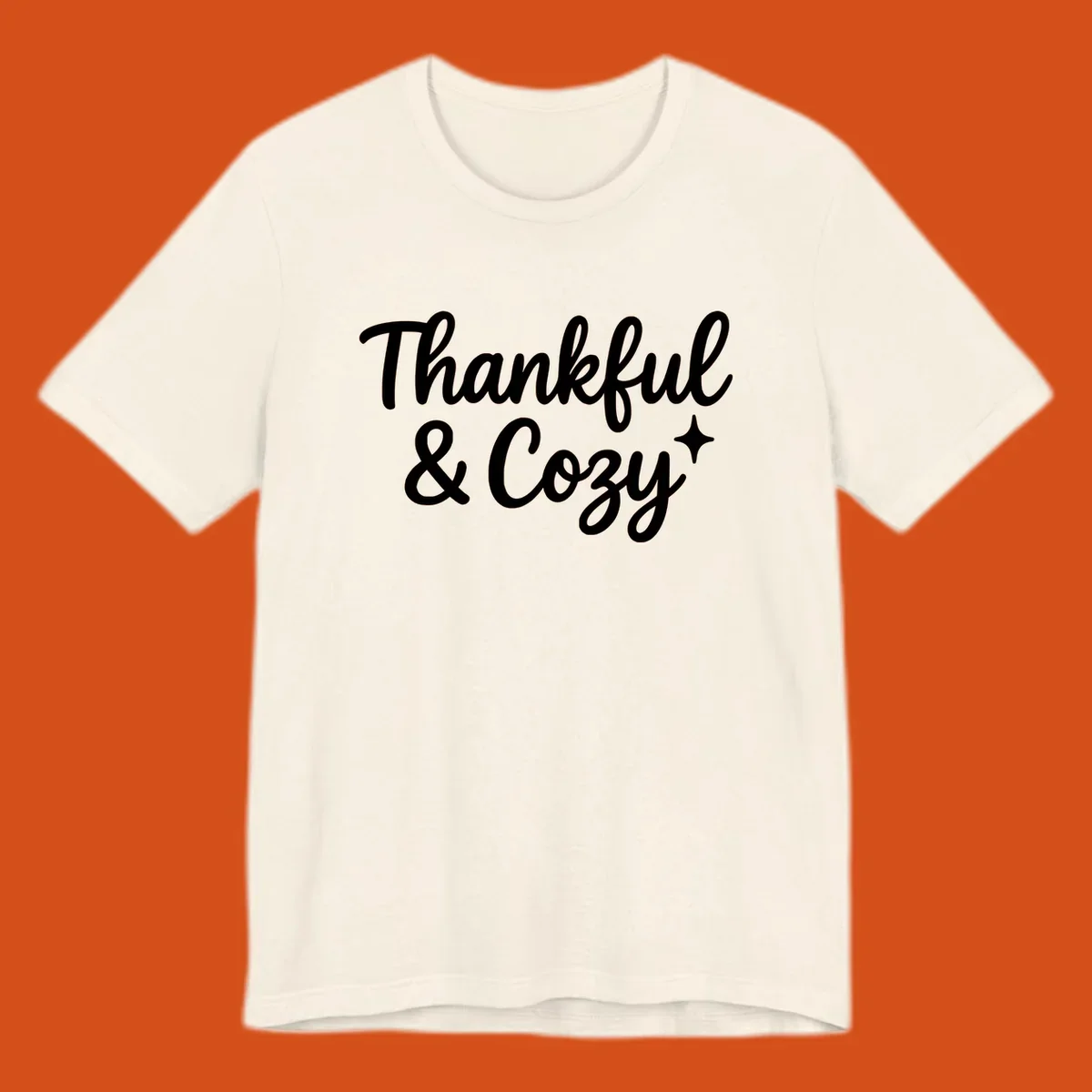 Thankful and cozy script text with starburst design.