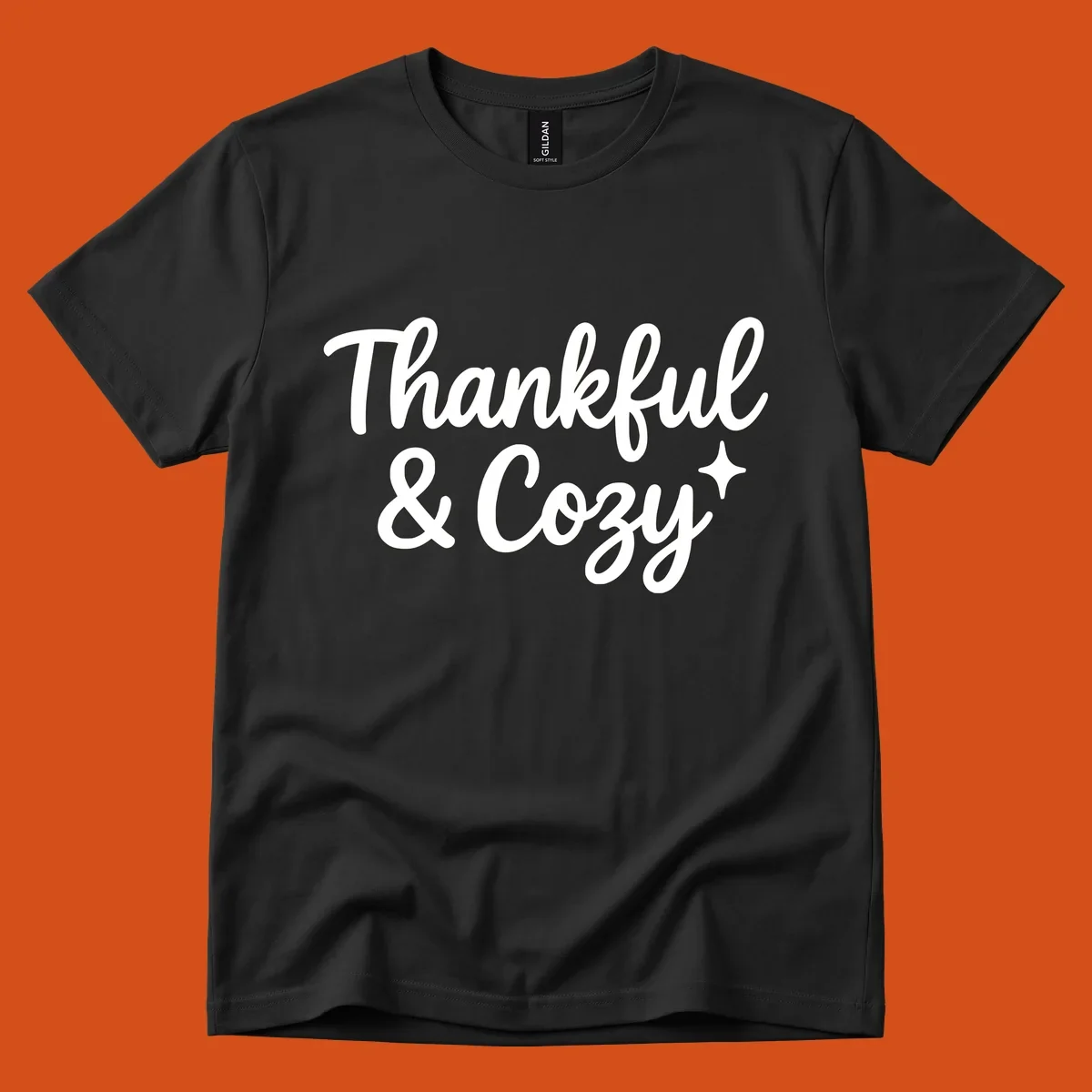 Thankful and cozy script text with starburst design.