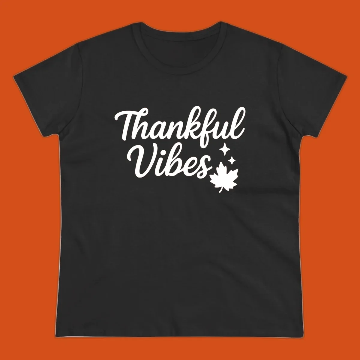 Thankful Vibes text with fall maple leaf and sparkles graphic.